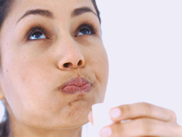 Полосканиях полости рта специализированными отварами.